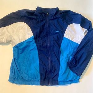Vintage Nike windbreaker in a blue colour with a big Nike swoosh (2 for $50)